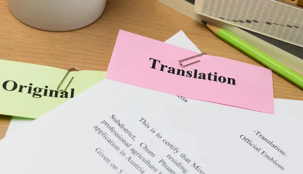 translation-paper-on-wooden-table